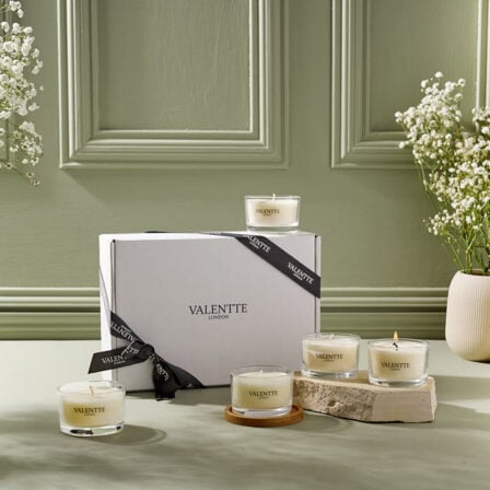 Our Spring Ritual Edit box, showcasing 5 75 gram candles, on a neutral green background