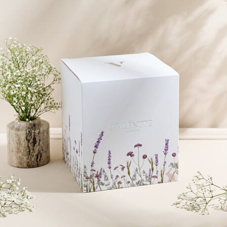 Our mystery box, showcasing a large box surrounded with Flowers and vase's